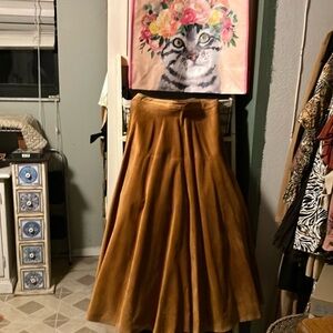 Size 12, 28 inch waist cognac suede leather skirt vintage and very nice luster